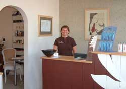 Mayflower Health and Beauty Clinic reception area with Aromatherapy Associates, Environ and St Tropez products in Beaconsfield, Bucks